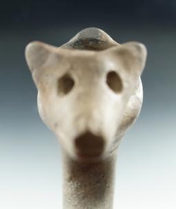 5 3/4" Wolf effigy clay pipe with partial restoration to the bowl, tip of one ear.  New York.