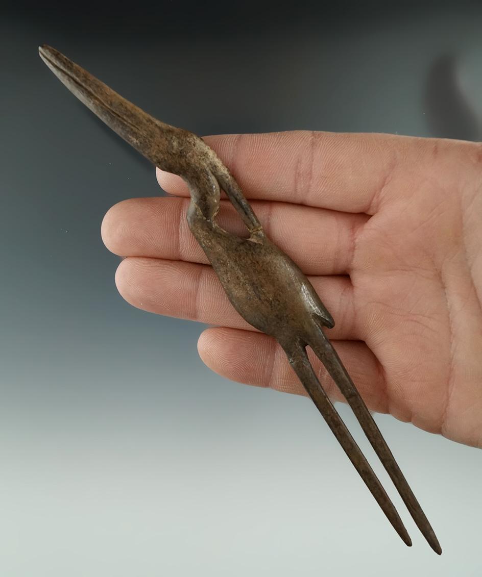 Exceptional! 7 1/8" long bird effigy bone hairpin found in New York that is glued tight in 3 places.