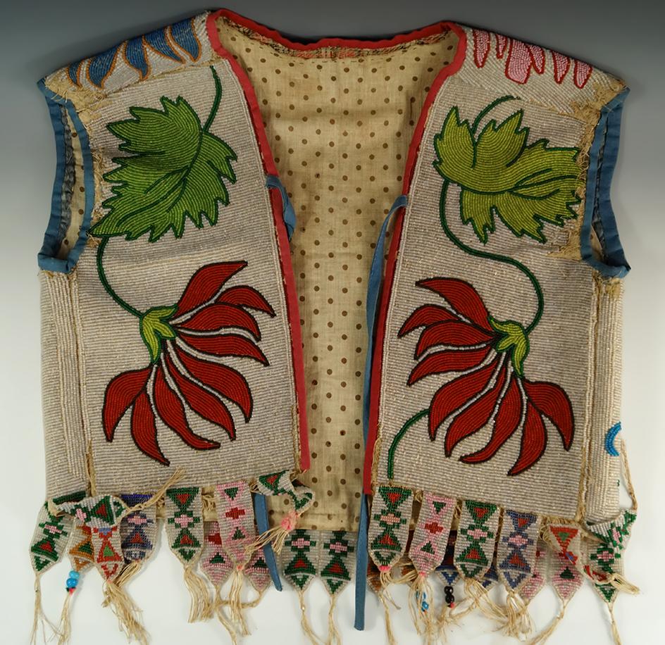 Anishinaabe Beaded Vest from the eary 1900's. Some wear and missing beads at shoulder areas.