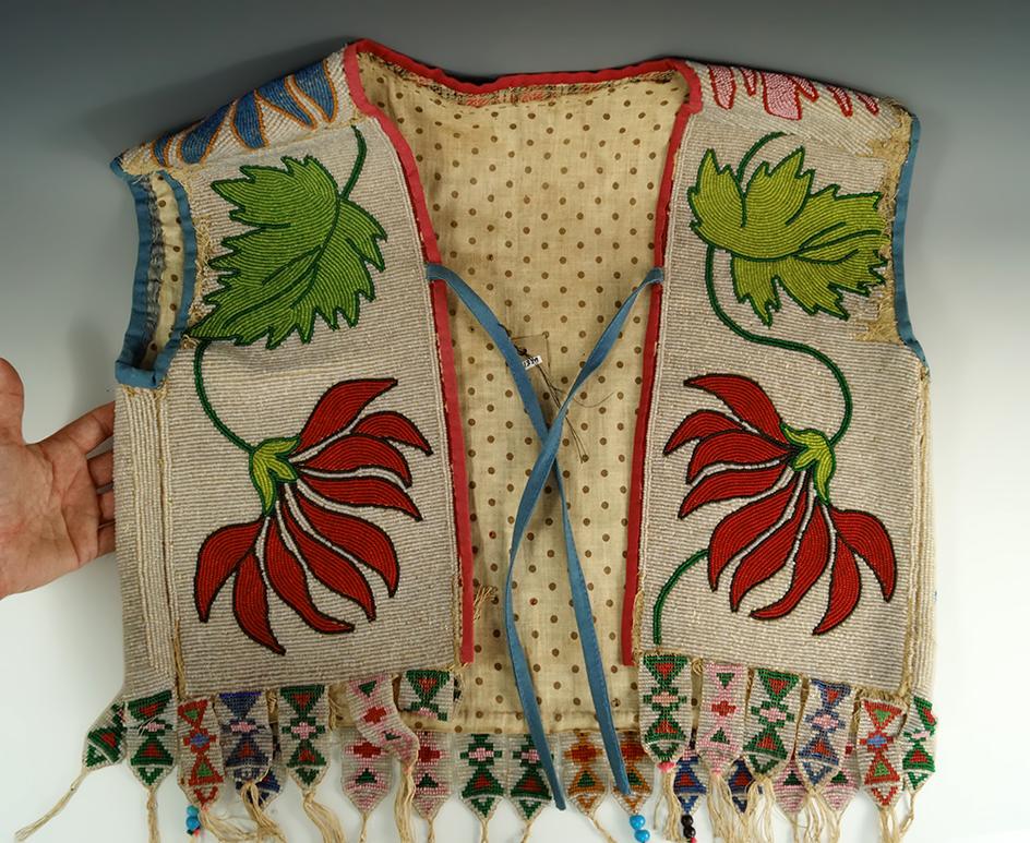 Anishinaabe Beaded Vest from the eary 1900's. Some wear and missing beads at shoulder areas.