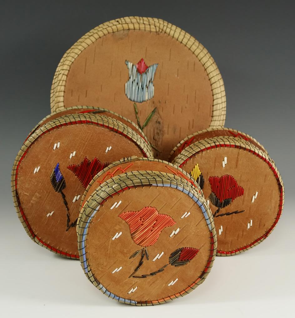 Set of four Birch bark lided Baskets with nice quill work. Largest is 6 1/2" diameter x 5" tall.