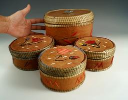 Set of four Birch bark lided Baskets with nice quill work. Largest is 6 1/2" diameter x 5" tall.