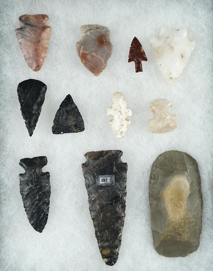 Group of 11 assorted artifacts from various locations.