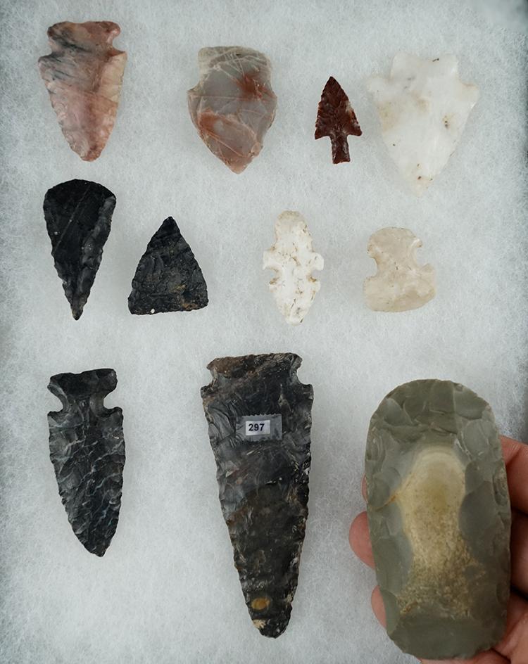 Group of 11 assorted artifacts from various locations.