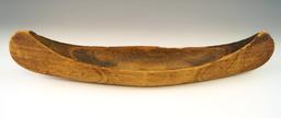 Vintage 13" long handcarved and nicely decorated wooden canoe from sugar Island, Michigan.