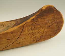 Vintage 13" long handcarved and nicely decorated wooden canoe from sugar Island, Michigan.