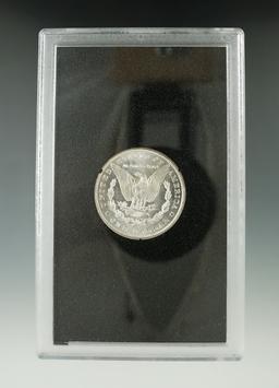 1883-CC Silver Dollar in GSA box with paper.