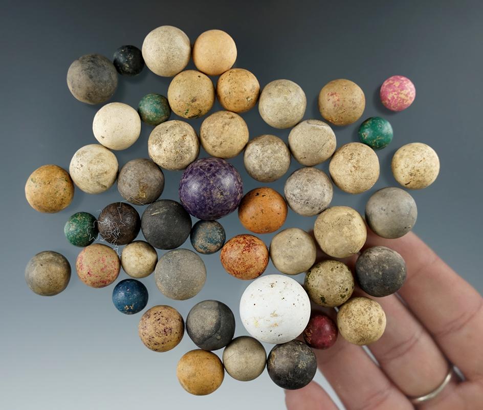 Nice group of old clay and stone marbles.