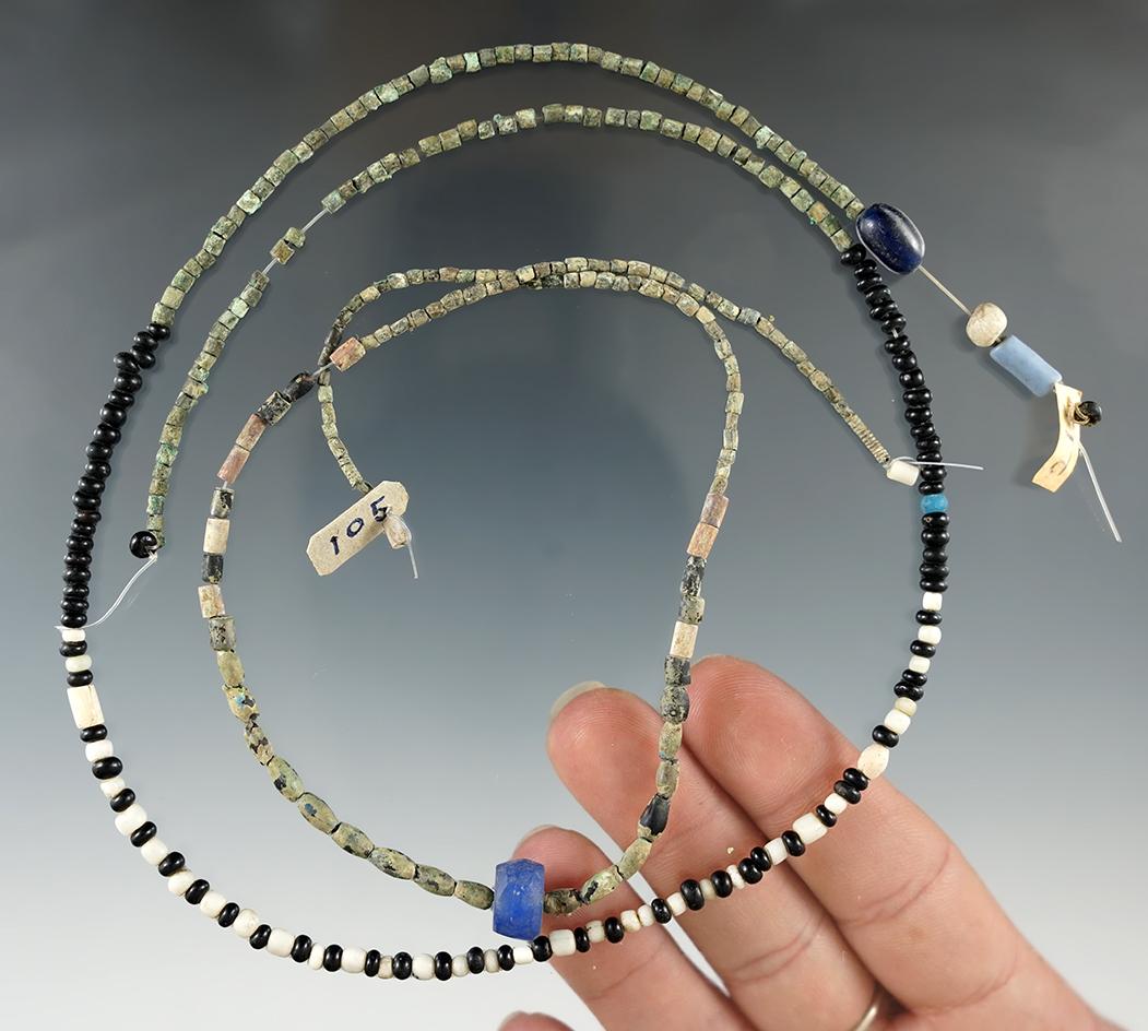 Two strands of old Trade Beads found in New York. One strand is 14" and the other is 20".
