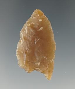 1 3/4" Paleo Folsom made from Knife River Flint with ancient damage to one ear - Brookings Co., SD.