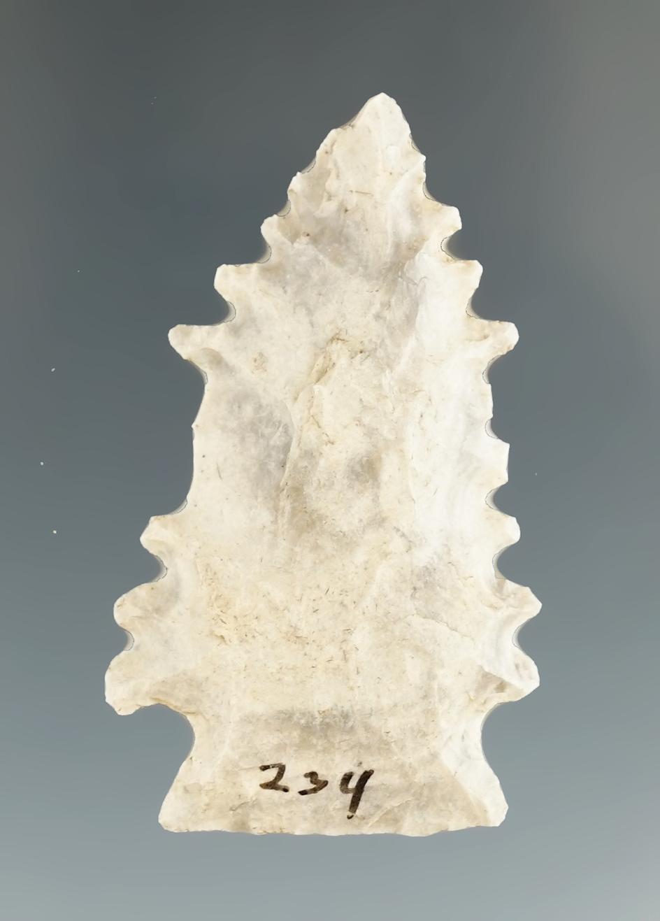 Excellent serrations on this 1 11/16" Archaic Cornernotch made from attractive Mozarkite Flint.