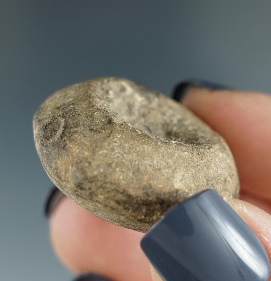 1 1/8" miniature double cupped Discoidal found in Ohio.