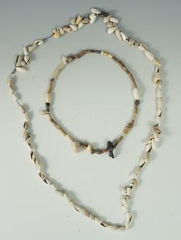 Pair of shell and stone bead necklaces. Largest is a 24" strand. The smaller necklace is a 13" stran