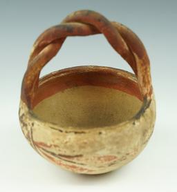 3 5/8" by 5" tall Southwestern pottery basket. Some wear on exterior, no breaks/restoration.