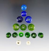 Group of 13 assorted vintage glass beads. Largest is 9/16".