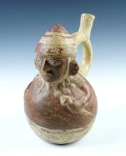 8" tall Moche II Human Effigy Bottle. One small crack at top of spout. Nice original paint.