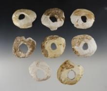Set of 8 Shell Hoes with large center holes for attachment. Found in Southeast Missouri.