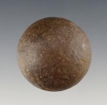 Nice form on this 1 3/4" diameter Game ball - brown Granite. Found in Crawford Co., Ohio.