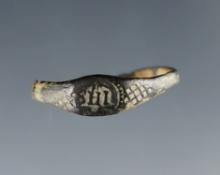 Jesuit Trade Ring with a narrow band and "IHS" on top with checkered border. New York.