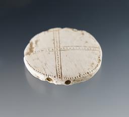 7/8" Shell Runtee with dotted cross lines. Found at the Upper Cayuga Great Gully Site.