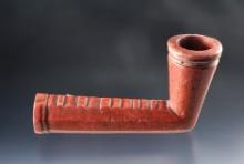 4 1/2" long Catlinite Pipe that is engraved. From the late 1800's-early 1900's.