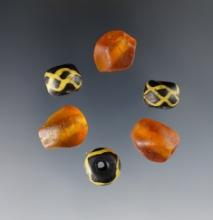 6 rare Beads. large amber faceted and large "Roman" beads. White Springs Site in Geneva, NY