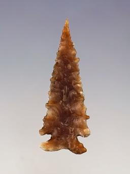 Well styled 1 3/8" needle tip Cornernotch made from Knife River Flint - High Plains region.