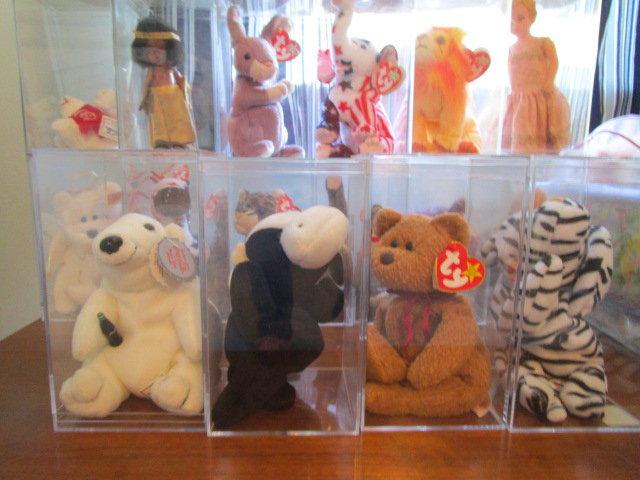 Lot of Beanie Babies in Cases and Collector Dolls