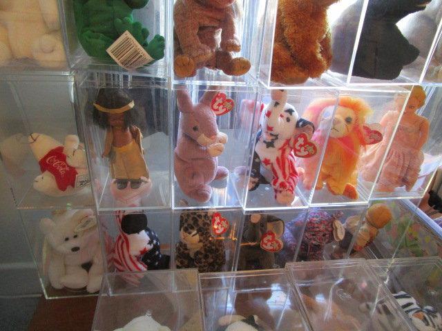 Lot of Beanie Babies in Cases and Collector Dolls