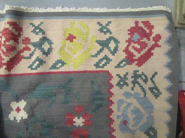 Woven Rug with Geometric Floral Design