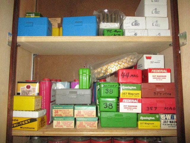 Contents of Two Wall Cabinets of Gun Powder, Misc. Live Ammo, Guide Books, etc.