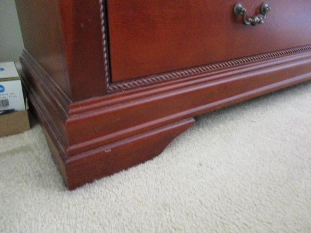 Eight Drawer Dresser with Framed Beveled Mirror