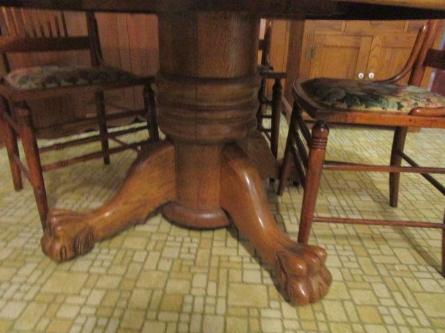 Oak Round Claw Foot Kitchen Table with Two Leaves and Four Chairs