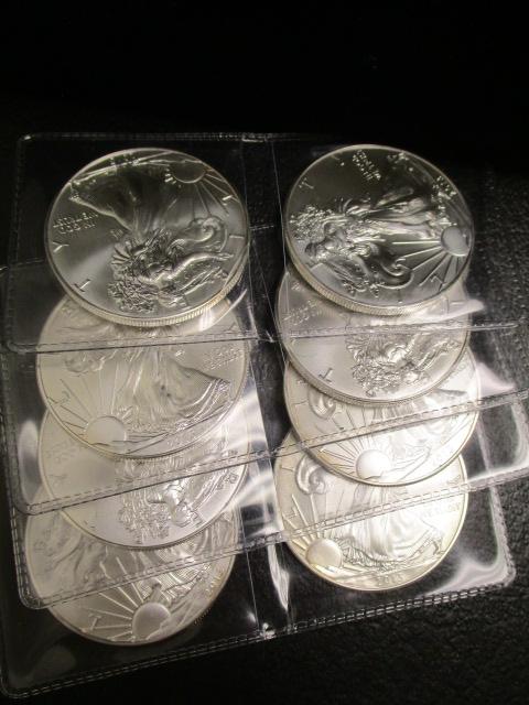 Lot of (11) American Eagle Silver Dollars