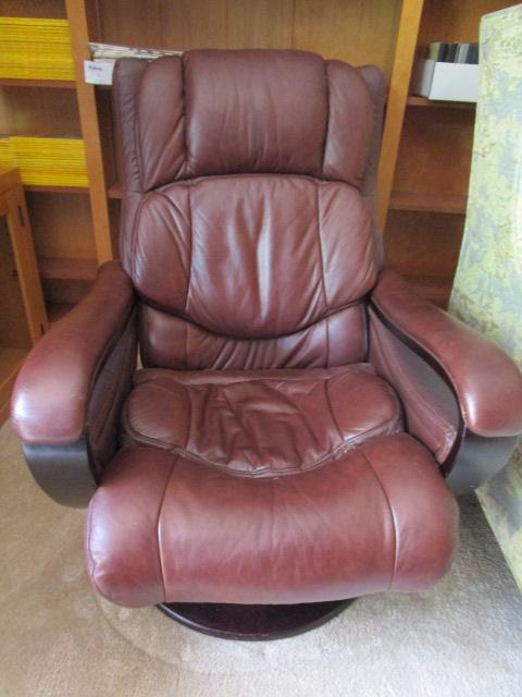 Lane Brown Leather Swiveling Recliner with Matching Swiveling Ottoman