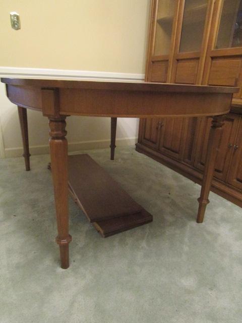 Oval Wood Dining Table with Three Leaves