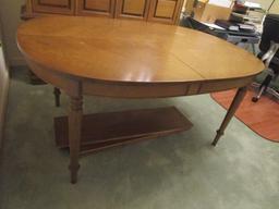 Oval Wood Dining Table with Three Leaves