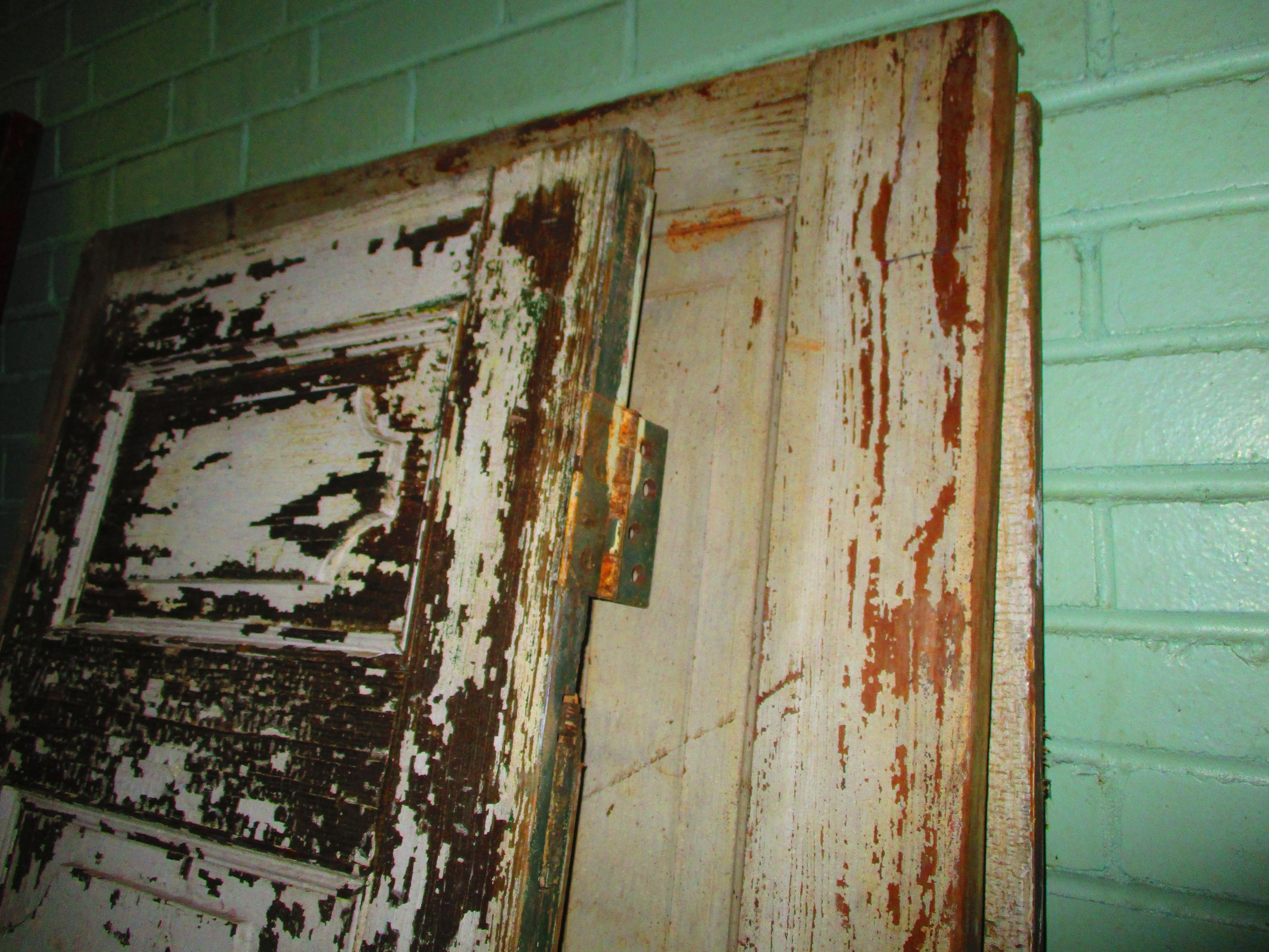 Three Vintage Wood Paneled Doors