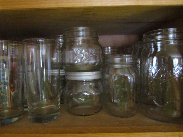 Contents of Wall Cabinet Left of Sink-Coca-Cola Glasses, Canning Jars, Wine