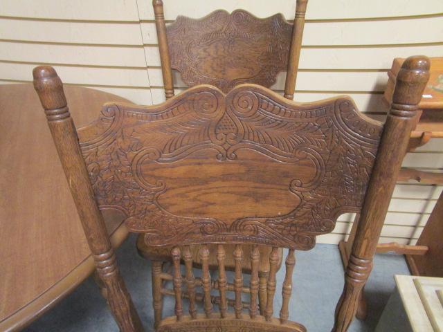 Round Table with Two Leaves and Six Oak Gingerbread Style Chairs