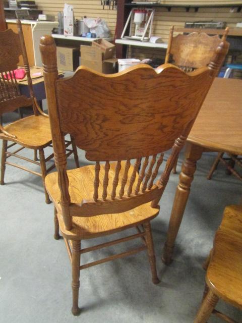 Round Table with Two Leaves and Six Oak Gingerbread Style Chairs