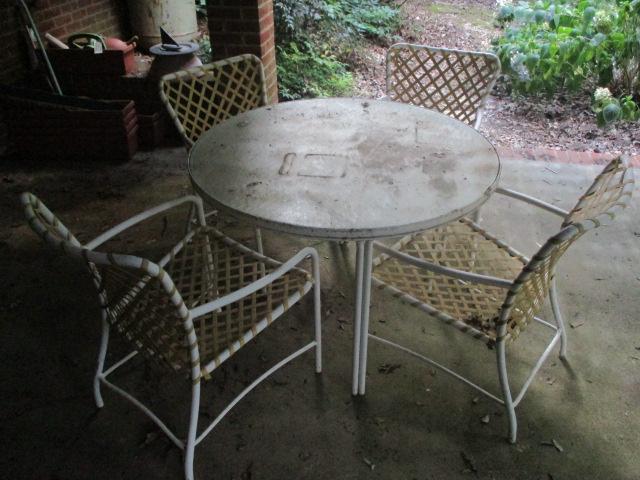 Round Table with Pebble Glass Top and Four Chairs with Plastic Woven Seat/Back