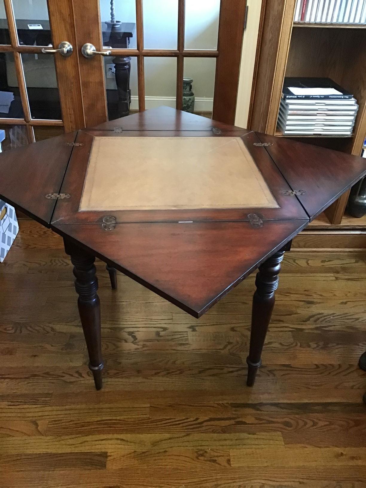 NICE WOOD GAME TABLE WITH SWIVEL TOP AND LEATHER INLAY