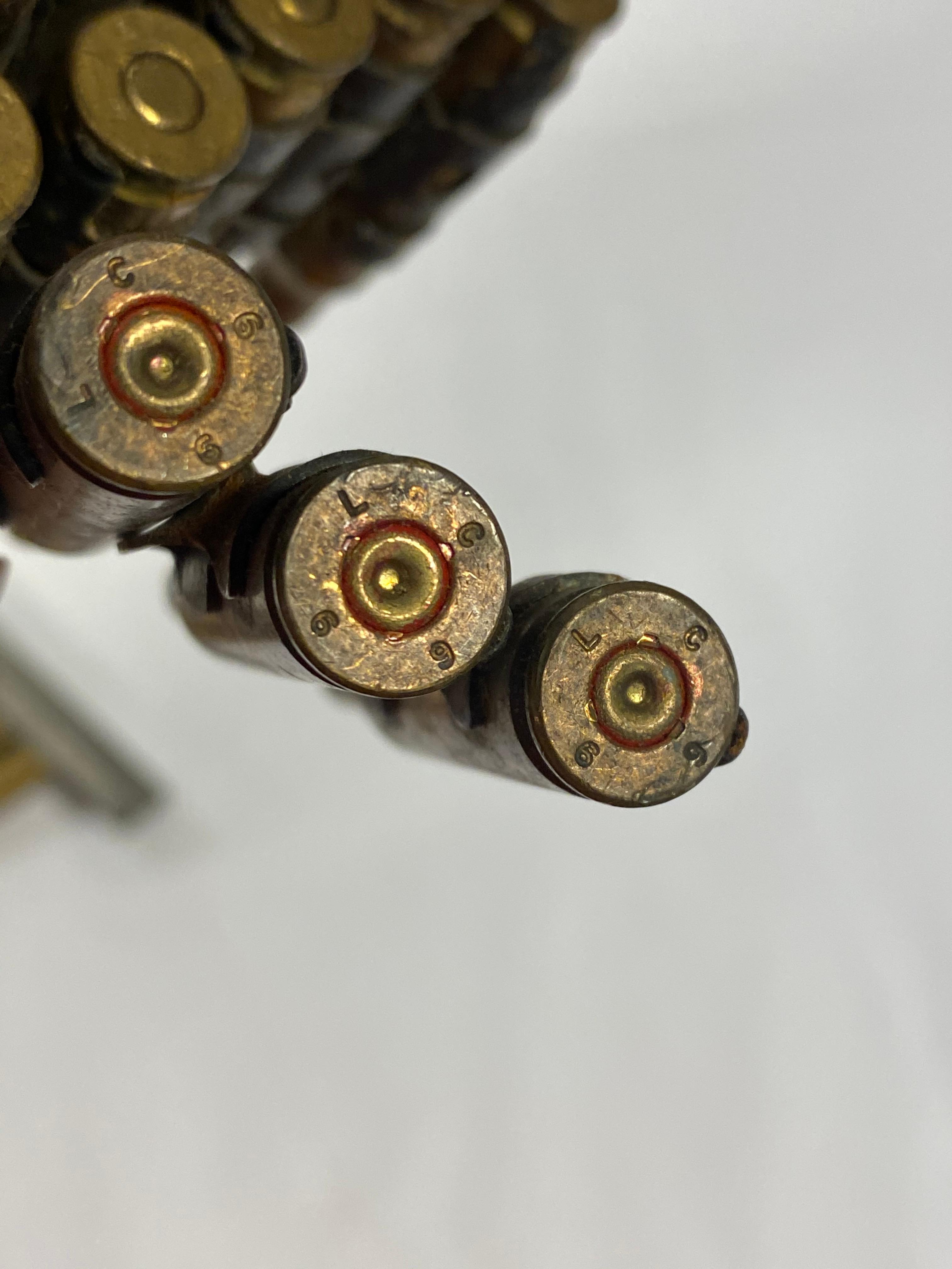 Linked Blank Cartridges and 4 Rounds Turkish 8mm Ammunition on Clip