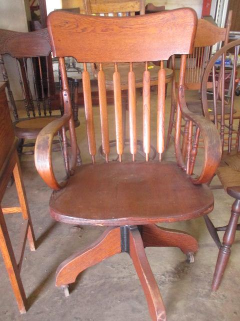 Antique The Ford & Johnson Co. Oak Rolling Chair with Bent Wood Arms