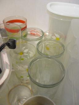 Partial Table Lot:   Plastic Storage, Vintage Glassware, Brown Crock,