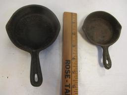 Two TE Jones Cast Iron Ashtrays:  1 Dated 1968. One "00" Ashtray