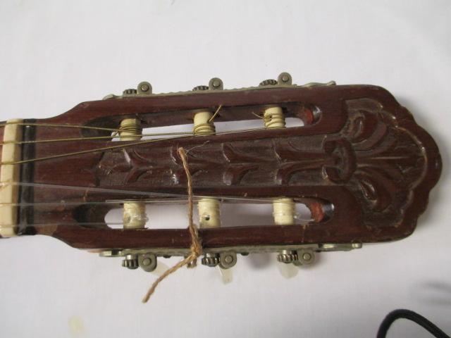 Guitar With Hand-Carved Headstock