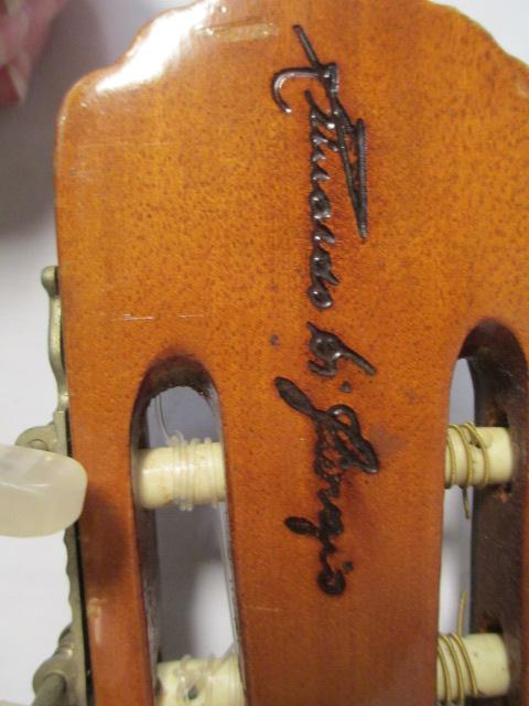 Guitar With Hand-Carved Headstock