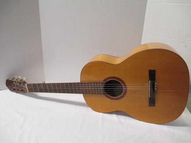 Guitar With Hand-Carved Headstock